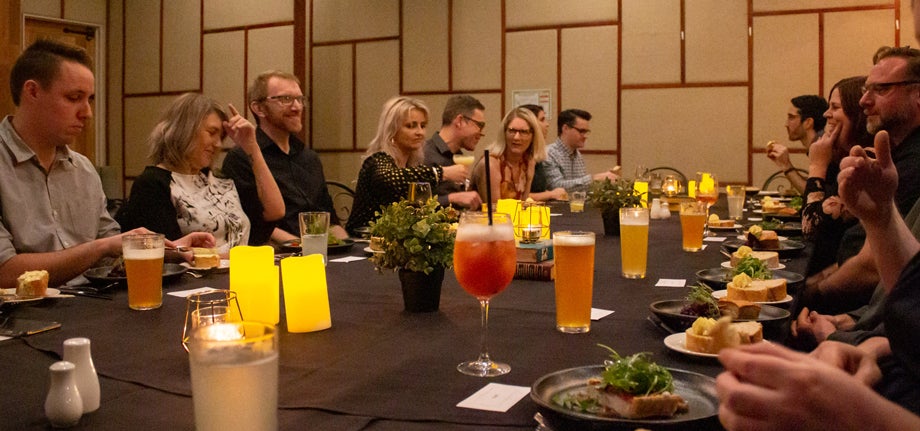 Zerosoeven team sitting down for dinner at the 2021 Winter Warmer