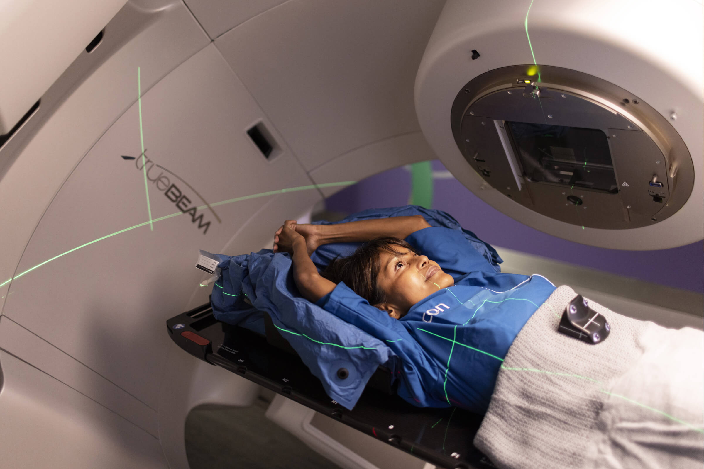Image of Icon Cancer Centre patient lying on scanning bed