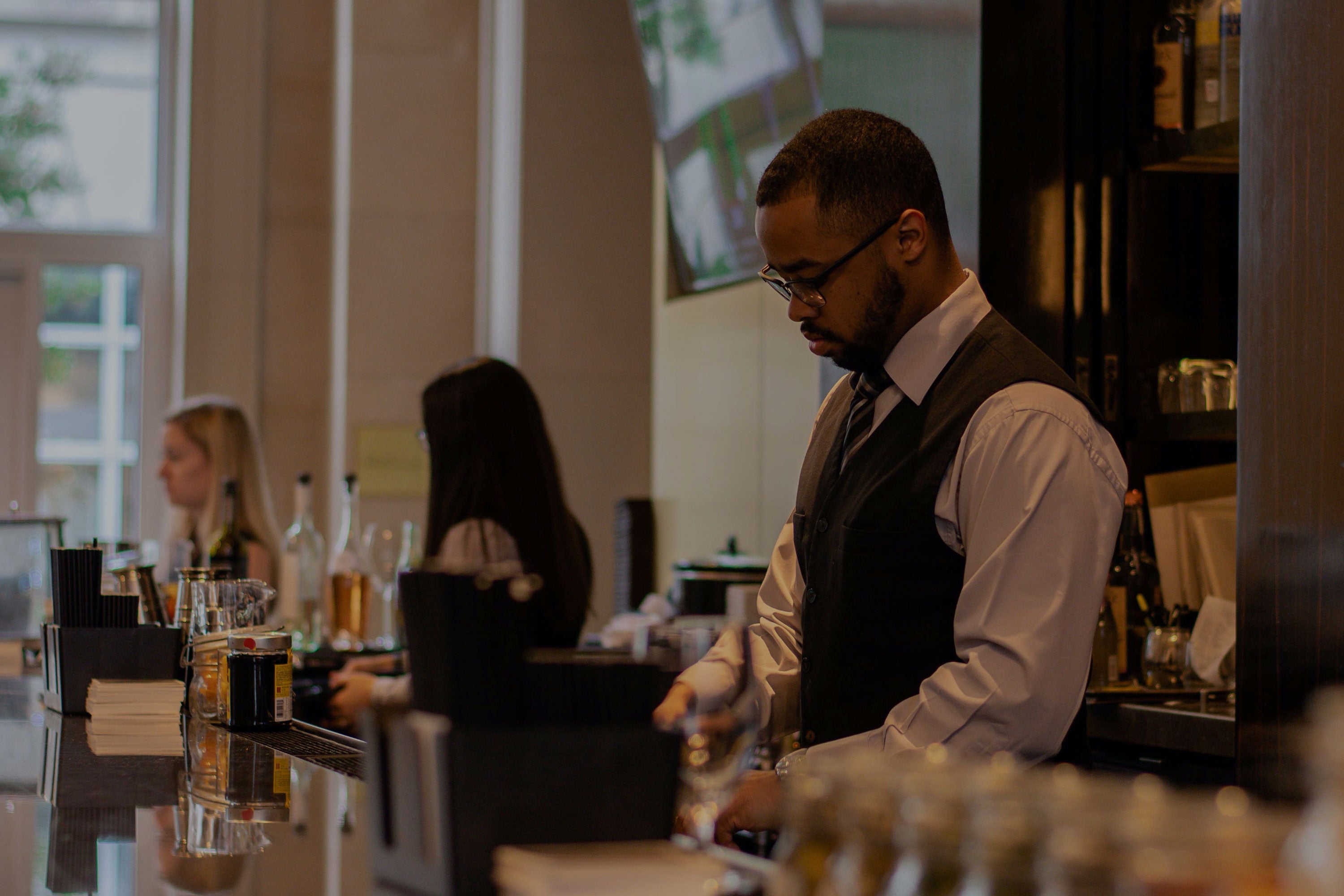 Service worker behind bar